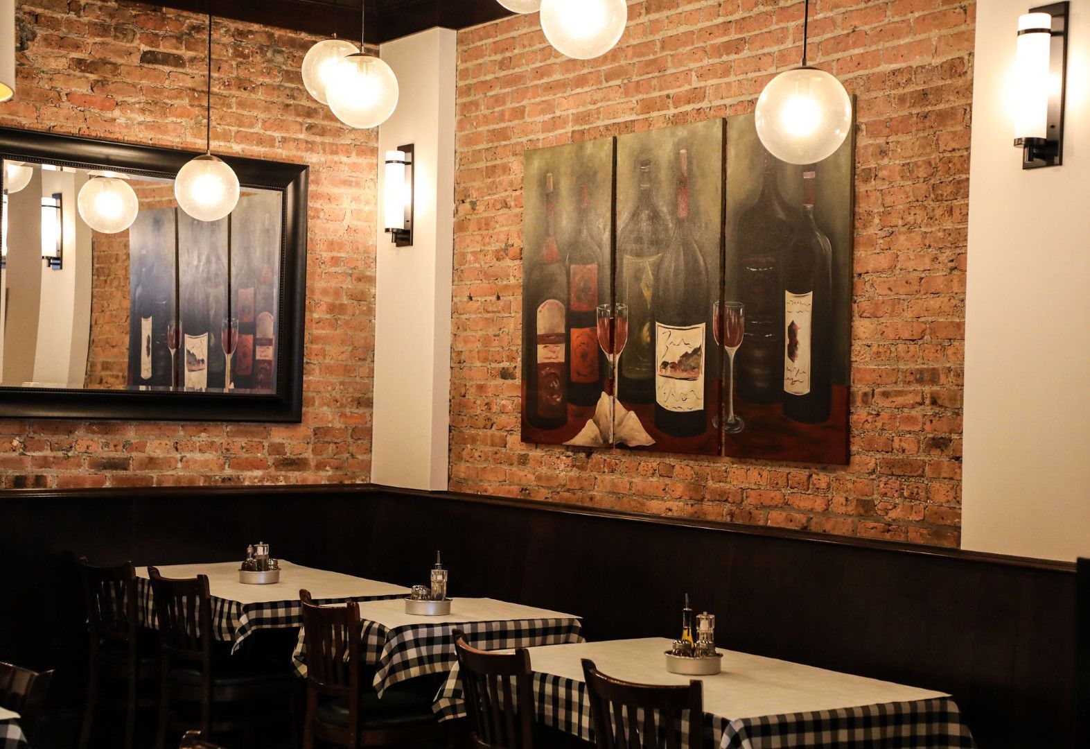 Giuliano's warm brick dining room